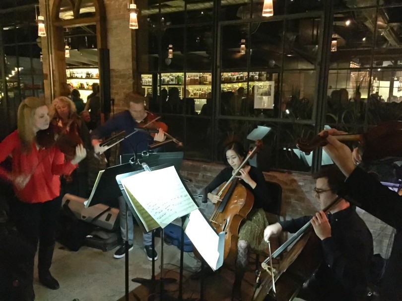 Members of the Utah Symphony (MOTUS) perform at Current Oyster & Fish in Salt Lake City.
